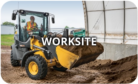 Worksite image of commercial equipment with loader