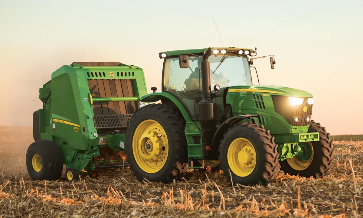 John Deere Utility Tractor with 560m Baler